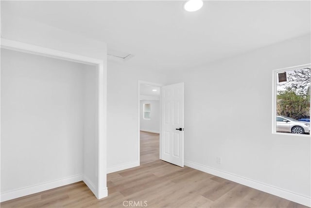 7307 Diamond St, Riverside, CA 92504 - empty room featuring light wood-style flooring, baseboards, and recessed lighting