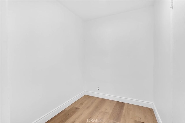 7307 Diamond St, Riverside, CA 92504 - empty room with light wood-style flooring and baseboards