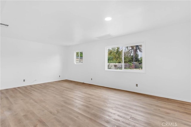 7307 Diamond St, Riverside, CA 92504 - unfurnished room featuring baseboards, recessed lighting, light wood-style floors, and visible vents