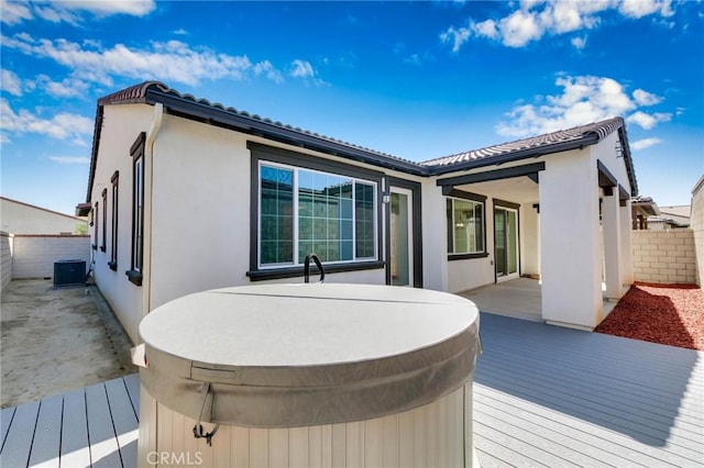 4021 E Perdido Privado, Ontario, CA 91761 - wooden terrace featuring fence, central air condition unit, and a hot tub