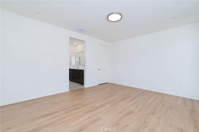 4021 E Perdido Privado, Ontario, CA 91761 - spare room with light wood-type flooring, baseboards, and visible vents