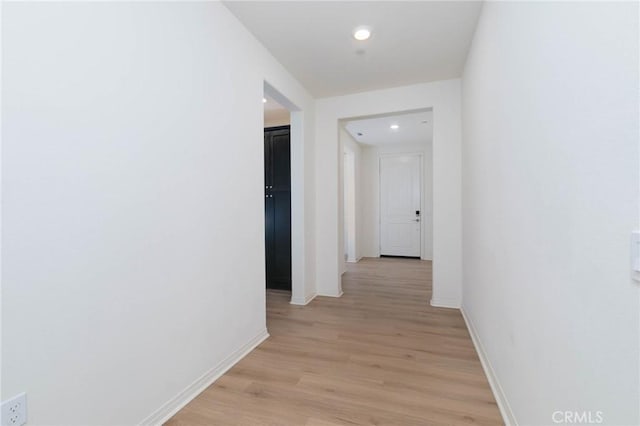 4021 E Perdido Privado, Ontario, CA 91761 - hall featuring baseboards, recessed lighting, and light wood-style flooring