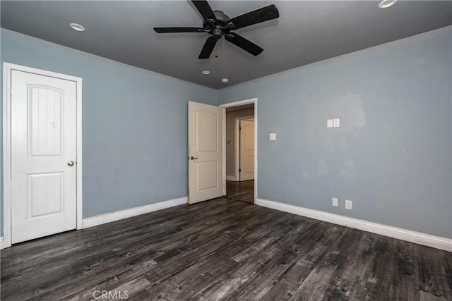 unfurnished bedroom featuring baseboards, a ceiling fan, dark wood finished floors, and recessed lighting
