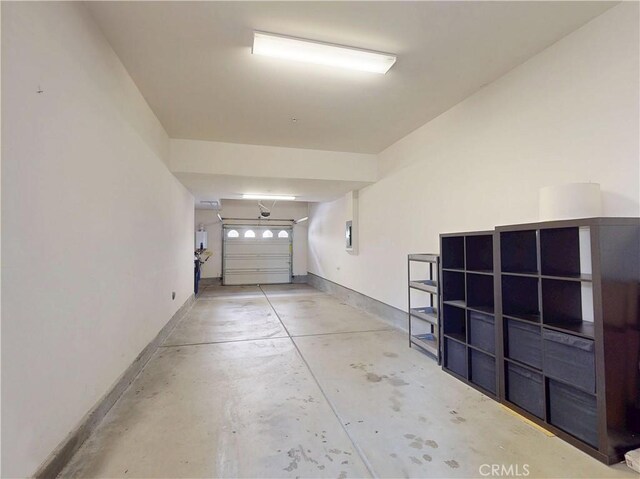 garage featuring baseboards