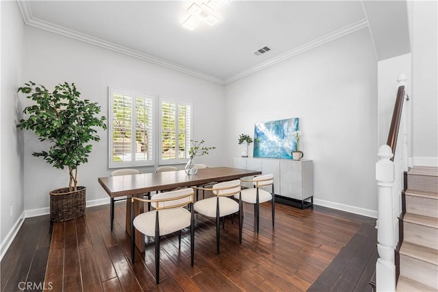 dining area with stairs, baseboards, hardwood / wood-style flooring, and crown molding