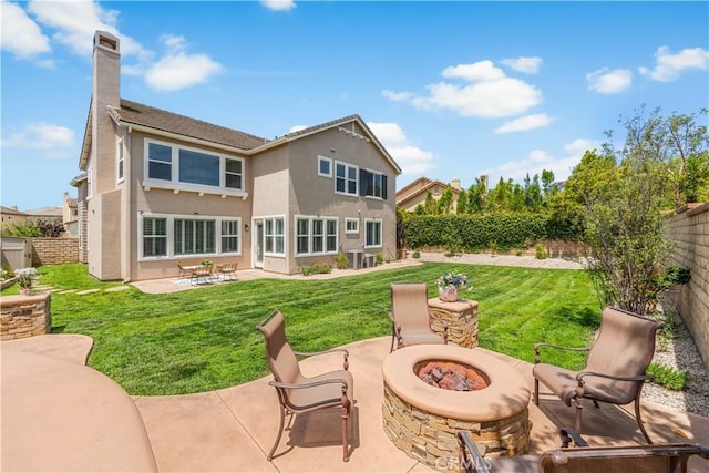 back of property featuring a fire pit, stucco siding, a patio, central air condition unit, and a chimney