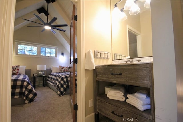 carpeted bedroom with an inviting chandelier and lofted ceiling with beams