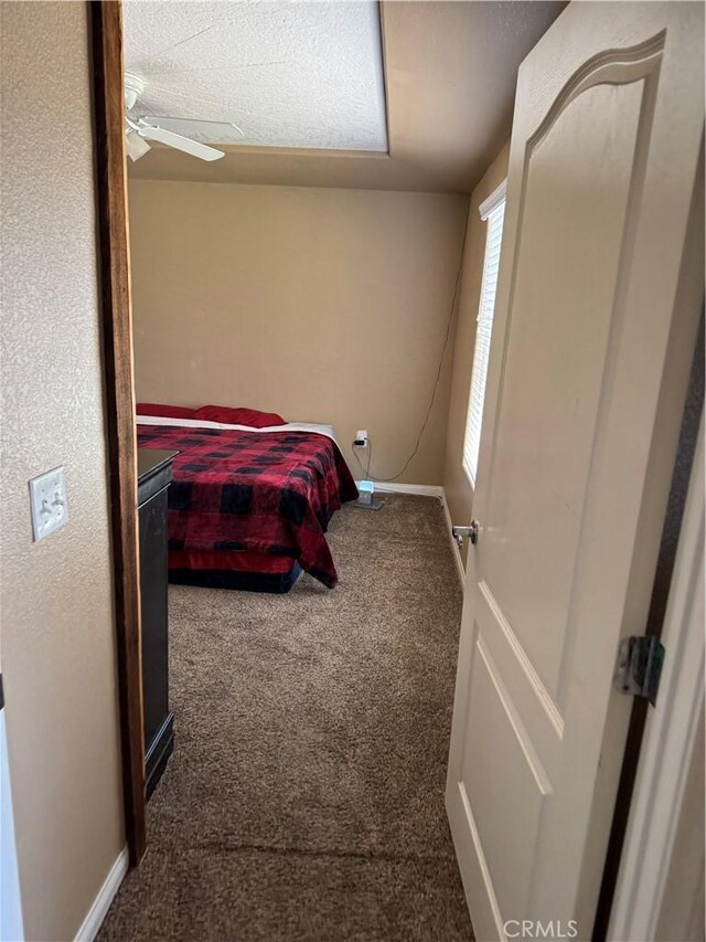 17815 Chestnut St, Hesperia, CA 92345 - carpeted bedroom featuring baseboards and a ceiling fan