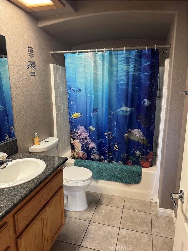 17815 Chestnut St, Hesperia, CA 92345 - bathroom featuring shower / tub combo with curtain, tile patterned flooring, vanity, toilet, and a textured wall