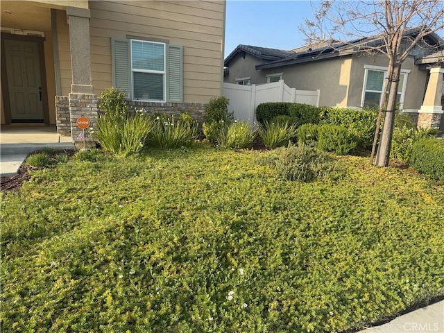 view of property exterior with fence
