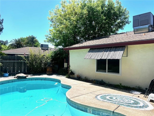 3324 Columbia Ave, Merced, CA 95340 - view of swimming pool with a fenced in pool and fence