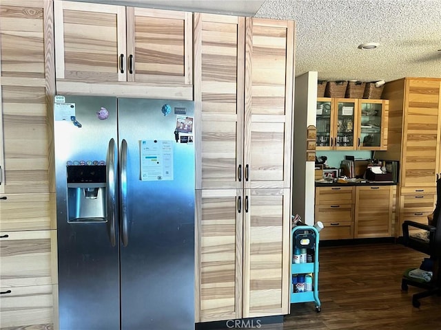 3324 Columbia Ave, Merced, CA 95340 - kitchen with glass insert cabinets, stainless steel refrigerator with ice dispenser, a textured ceiling, and dark wood-type flooring