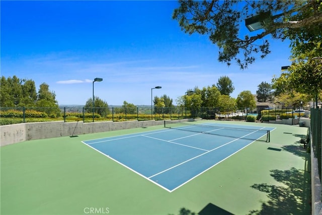view of sport court with fence and community basketball court