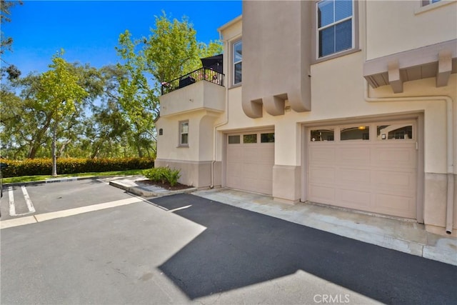 12 Saphir Way, Aliso Viejo, CA 92656 - view of property featuring a garage