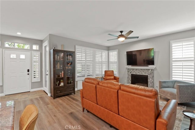 12 Saphir Way, Aliso Viejo, CA 92656 - living room with a ceiling fan, light wood-style floors, recessed lighting, and a fireplace