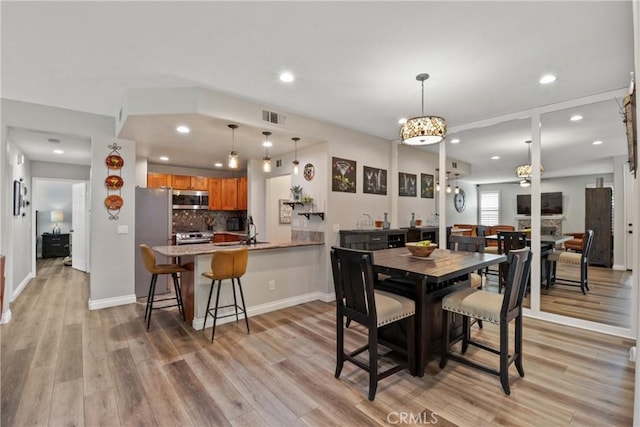 12 Saphir Way, Aliso Viejo, CA 92656 - dining space featuring light wood-type flooring and recessed lighting