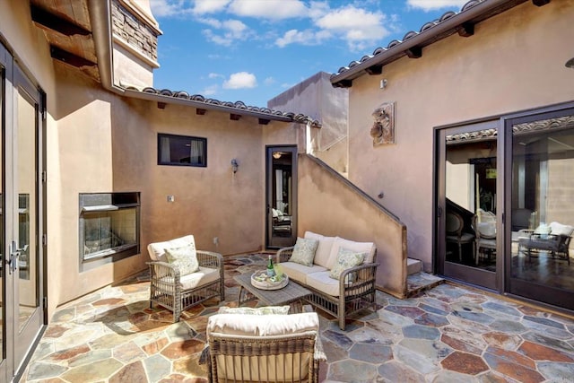 view of patio / terrace featuring an outdoor hangout area and french doors