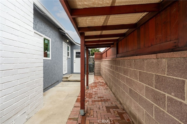 4744 Adenmoor Ave, Lakewood, CA 90713 - view of side of home with a patio area and stucco siding