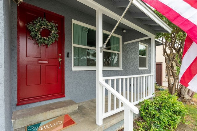 4744 Adenmoor Ave, Lakewood, CA 90713 - property entrance featuring stucco siding and a porch