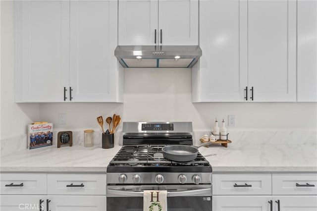 4744 Adenmoor Ave, Lakewood, CA 90713 - kitchen featuring stainless steel range with gas cooktop, under cabinet range hood, white cabinets, and light stone countertops