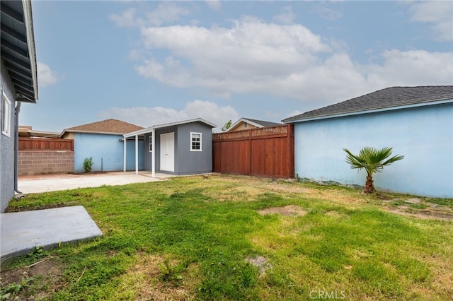 4744 Adenmoor Ave, Lakewood, CA 90713 - view of yard with a fenced backyard, an outdoor structure, and a patio area
