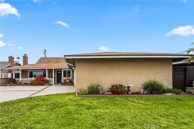 14901 Quill Cir, Huntington Beach, CA 92647 - view of front of property featuring stucco siding and a chimney