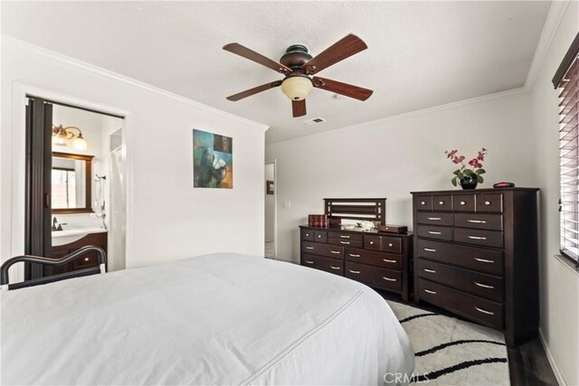 14901 Quill Cir, Huntington Beach, CA 92647 - bedroom featuring ornamental molding, a ceiling fan, and baseboards