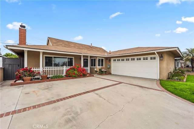 14901 Quill Cir, Huntington Beach, CA 92647 - single story home with stucco siding, covered porch, an attached garage, and driveway