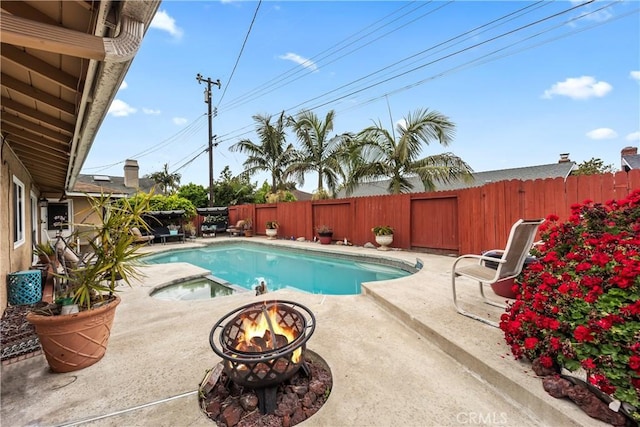 14901 Quill Cir, Huntington Beach, CA 92647 - view of pool with a fire pit, a patio, and a fenced backyard
