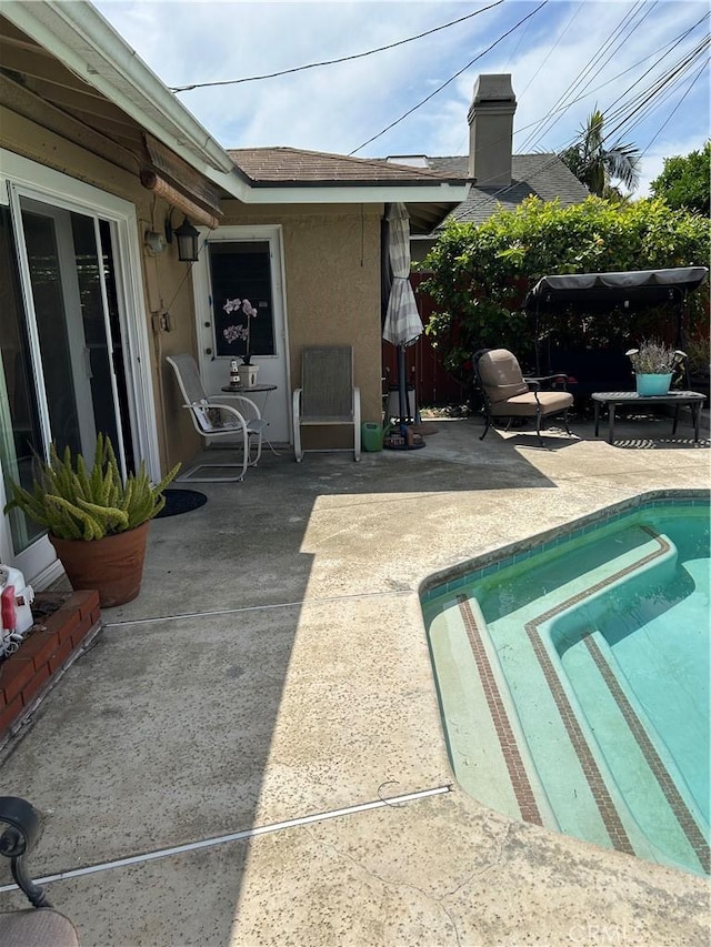 14901 Quill Cir, Huntington Beach, CA 92647 - view of swimming pool featuring a patio area