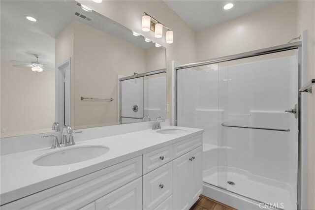 137 Macintosh Way, Upland, CA 91786 - bathroom featuring double vanity, a sink, a ceiling fan, and a shower stall