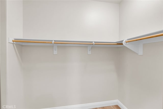 137 Macintosh Way, Upland, CA 91786 - spacious closet featuring light wood-style flooring