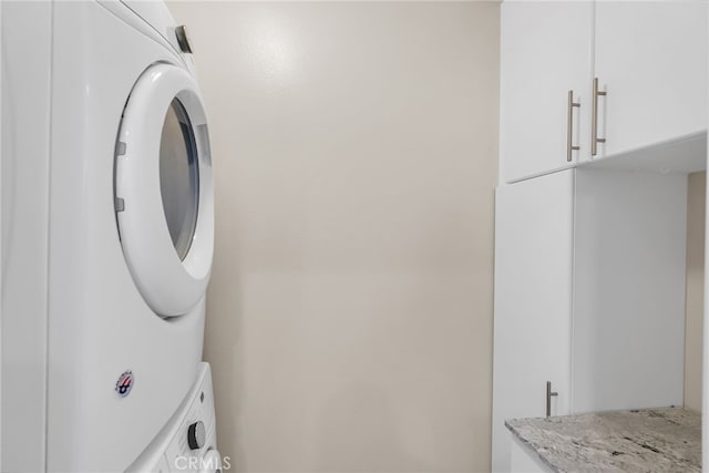 137 Macintosh Way, Upland, CA 91786 - clothes washing area with cabinet space and stacked washer / drying machine