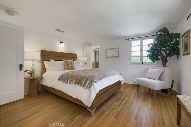 516 E Stocker St, Glendale, CA 91207 - bedroom featuring light wood finished floors, baseboards, and crown molding