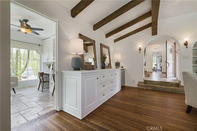 516 E Stocker St, Glendale, CA 91207 - hall featuring arched walkways, dark wood finished floors, and baseboards