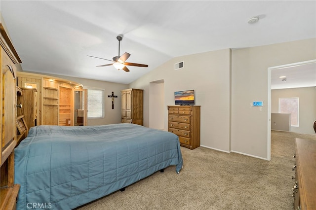 bedroom with visible vents, a ceiling fan, carpet, and vaulted ceiling