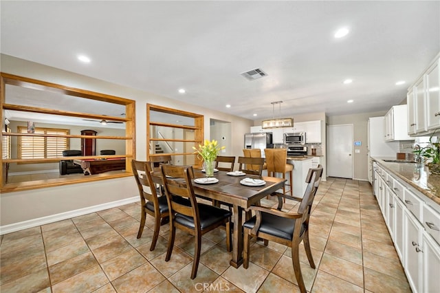 dining space featuring light tile patterned floors, baseboards, recessed lighting, and visible vents