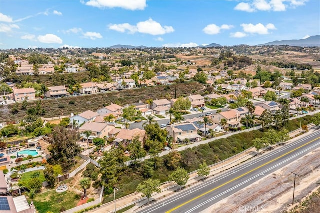 bird's eye view with a residential view and a mountain view