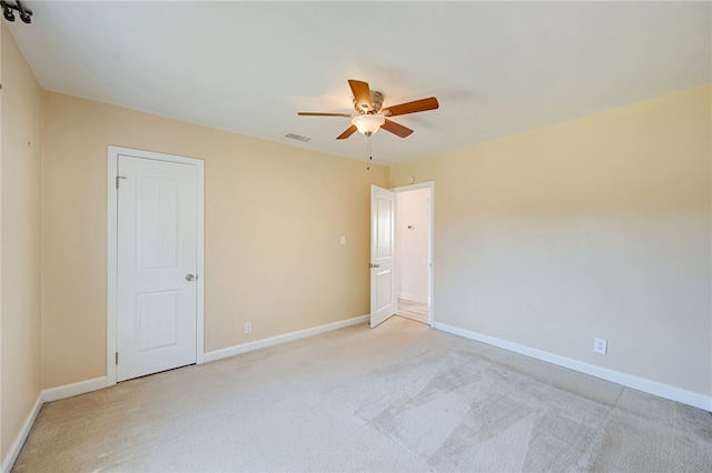 2030 N Keene Ave, Compton, CA 90059 - empty room featuring a ceiling fan, light carpet, and baseboards