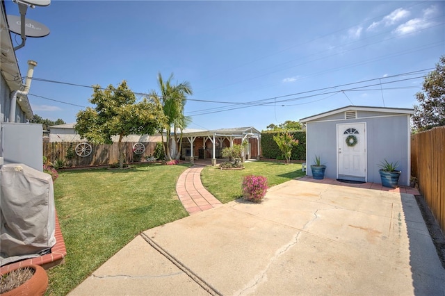 2030 N Keene Ave, Compton, CA 90059 - view of yard featuring a patio and an outbuilding