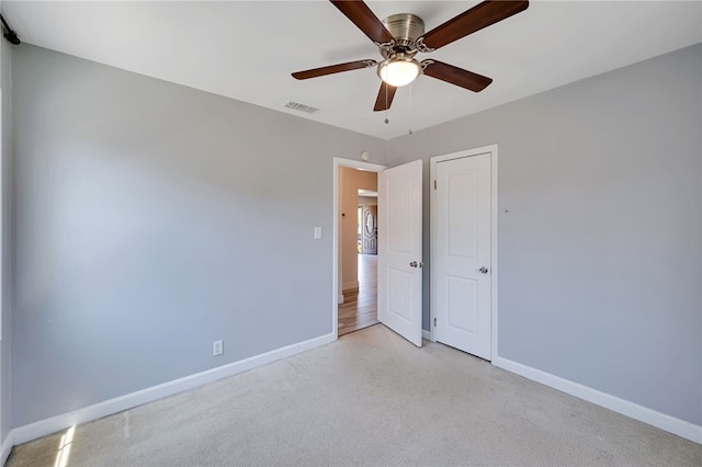 2030 N Keene Ave, Compton, CA 90059 - unfurnished bedroom with baseboards and ceiling fan