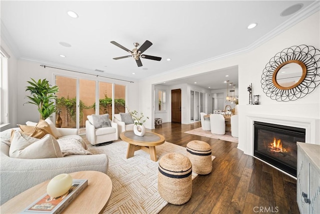3040 E Coalinga Dr, Brea, CA 92821 - living room featuring hardwood / wood-style floors, crown molding, ceiling fan, a glass covered fireplace, and recessed lighting