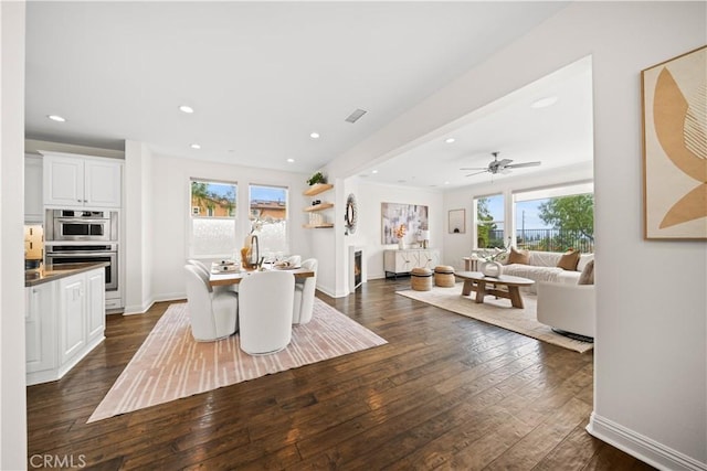 3040 E Coalinga Dr, Brea, CA 92821 - dining area with dark wood finished floors, recessed lighting, baseboards, and ceiling fan