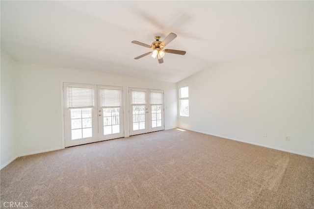 41044 Oak Creek Rd, Murrieta, CA 92562 - carpeted empty room featuring vaulted ceiling, a ceiling fan, baseboards, and french doors