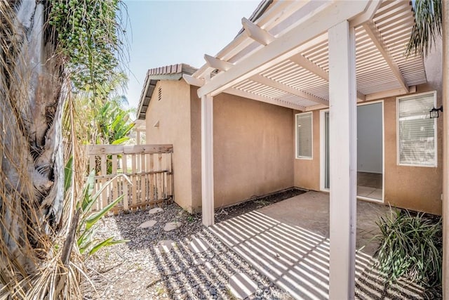 41044 Oak Creek Rd, Murrieta, CA 92562 - view of patio featuring a pergola and a gate