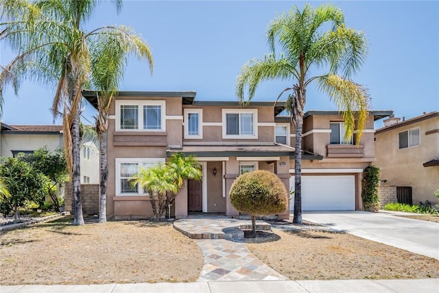 41044 Oak Creek Rd, Murrieta, CA 92562 - view of front of property featuring stucco siding, driveway, and an attached garage