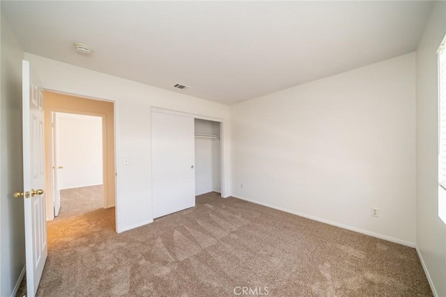 41044 Oak Creek Rd, Murrieta, CA 92562 - unfurnished bedroom featuring carpet, a closet, and baseboards