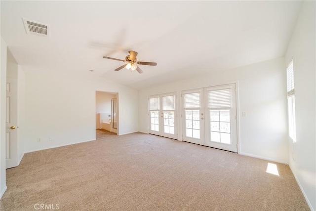 41044 Oak Creek Rd, Murrieta, CA 92562 - spare room with light colored carpet, a ceiling fan, baseboards, and lofted ceiling