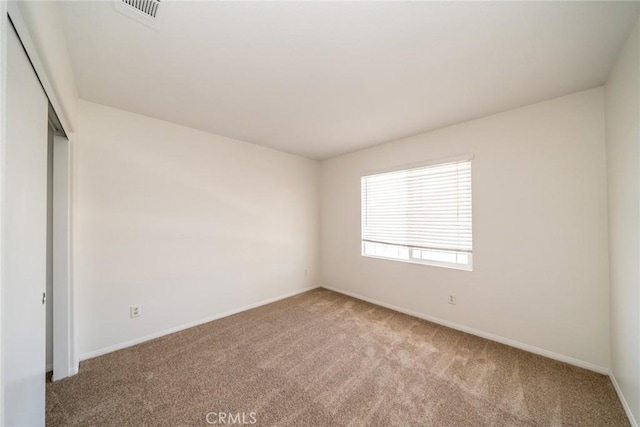 41044 Oak Creek Rd, Murrieta, CA 92562 - carpeted empty room with baseboards