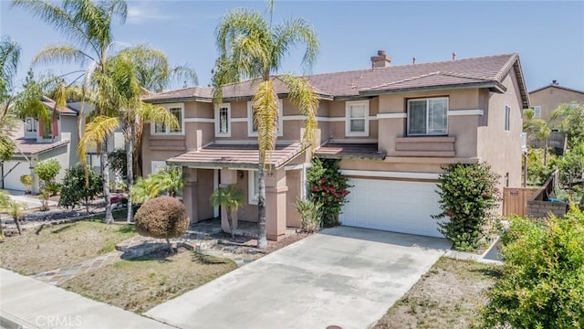 41044 Oak Creek Rd, Murrieta, CA 92562 - view of front of property with stucco siding, concrete driveway, a chimney, and a garage